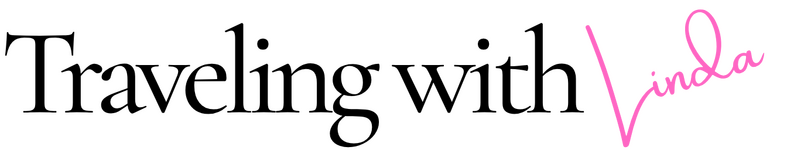 Image of signature L of Traveling with Linda